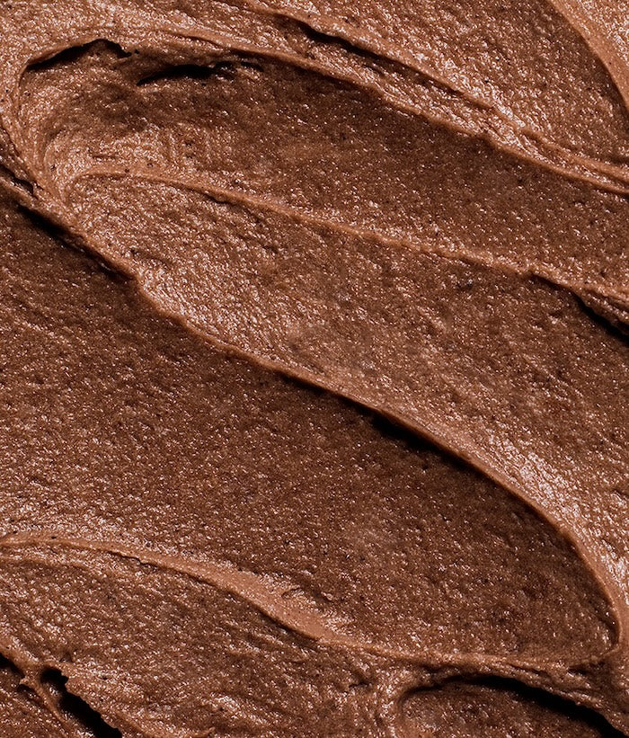 Close-up of Brownie Batter Buttercream Frosting showcasing its brown swirled texture