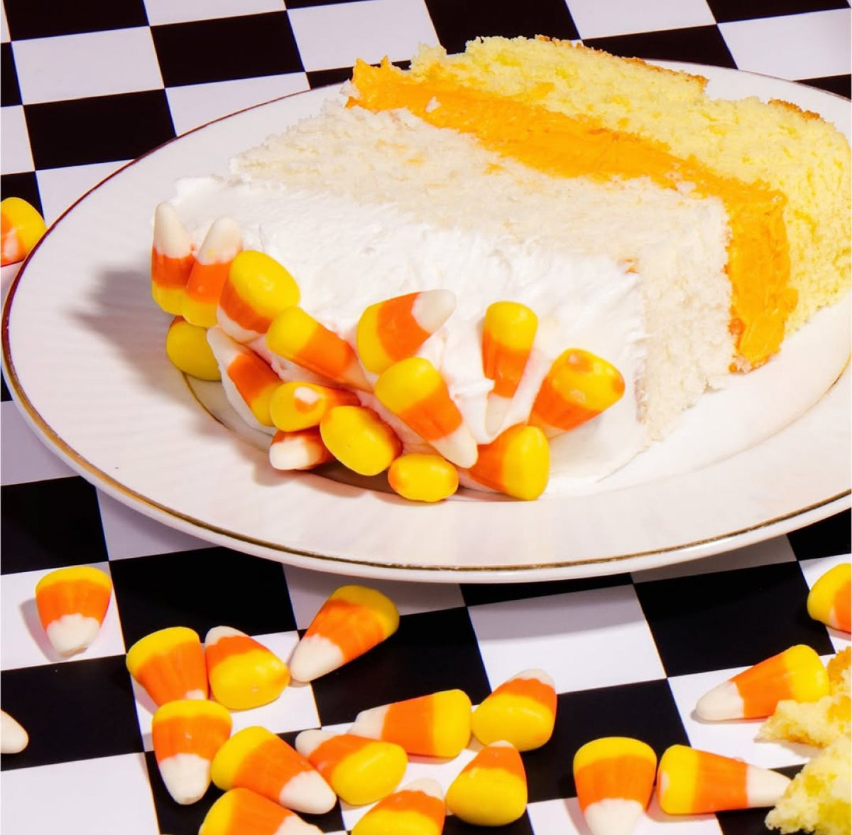 Layer cake frosted with PiiPER candy corn buttercream frosting